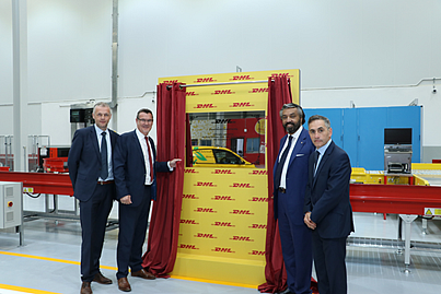 Mike Barrett, Vice President Operations, DHL Express UAE, Geoff Walsh, UAE Country Manager, DHL Express, Nour Suliman, CEO, DHL Express MENA, and Bachi Spiga, Vice President of Operations, DHL Express MENA, open the new facility
