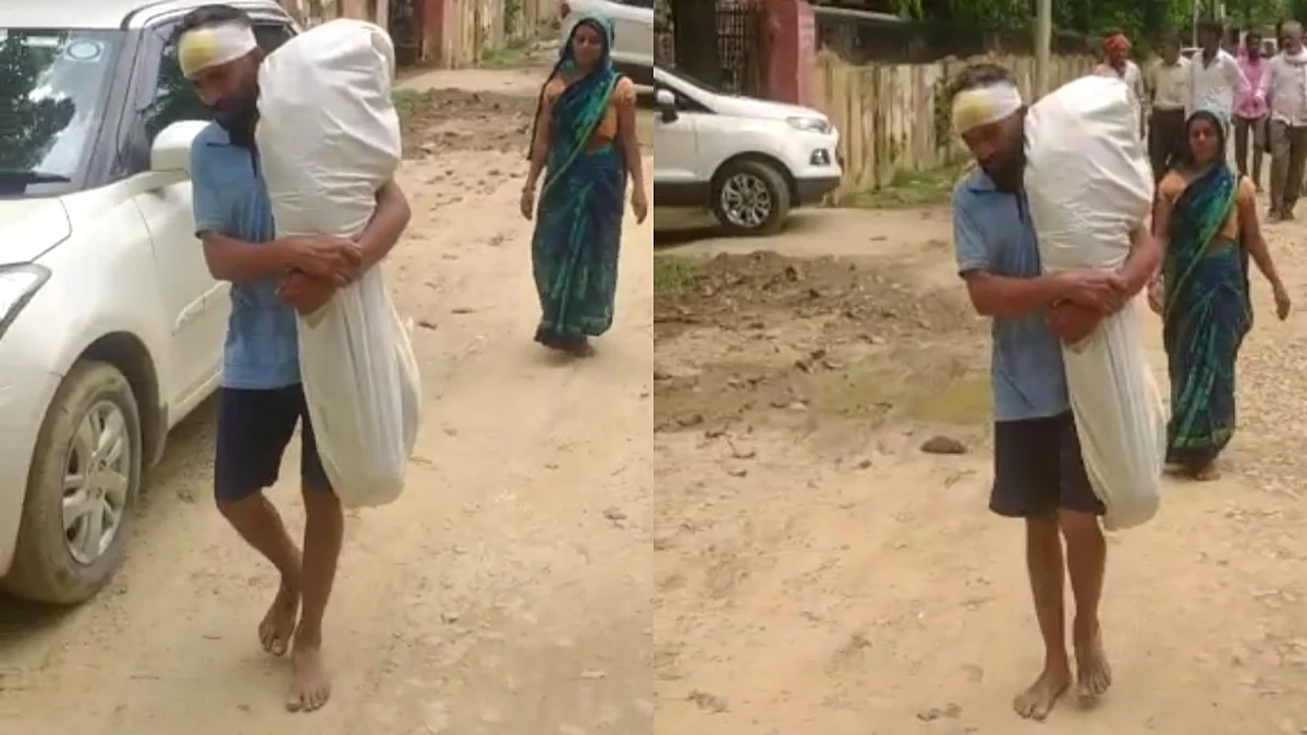बेटे की लाश को कंधे पर लादे पिता की तस्वीर सोशल मीडिया पर वायरल हो रही है.