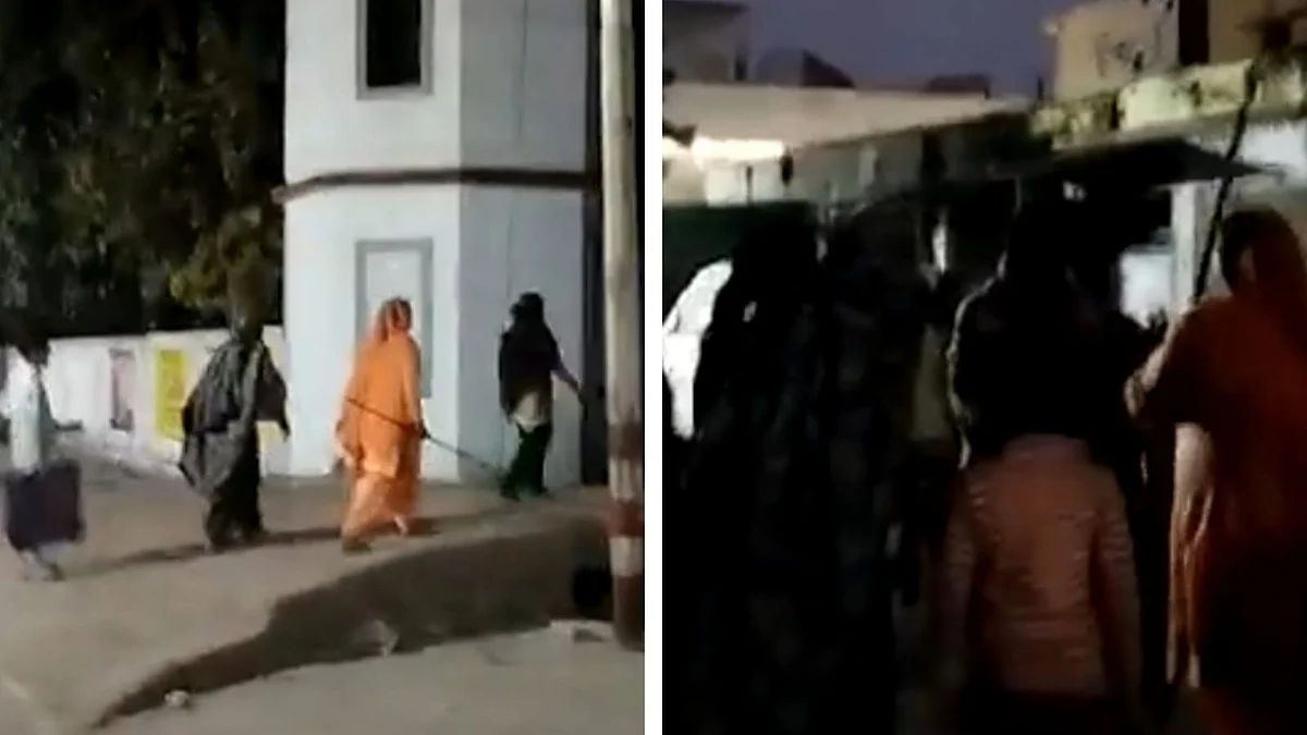 बरेली: थाने में डंडा लेकर पहुंची महिला ने युवक को धून दिया, पुलिस देखती रही? वीडियो वायरल