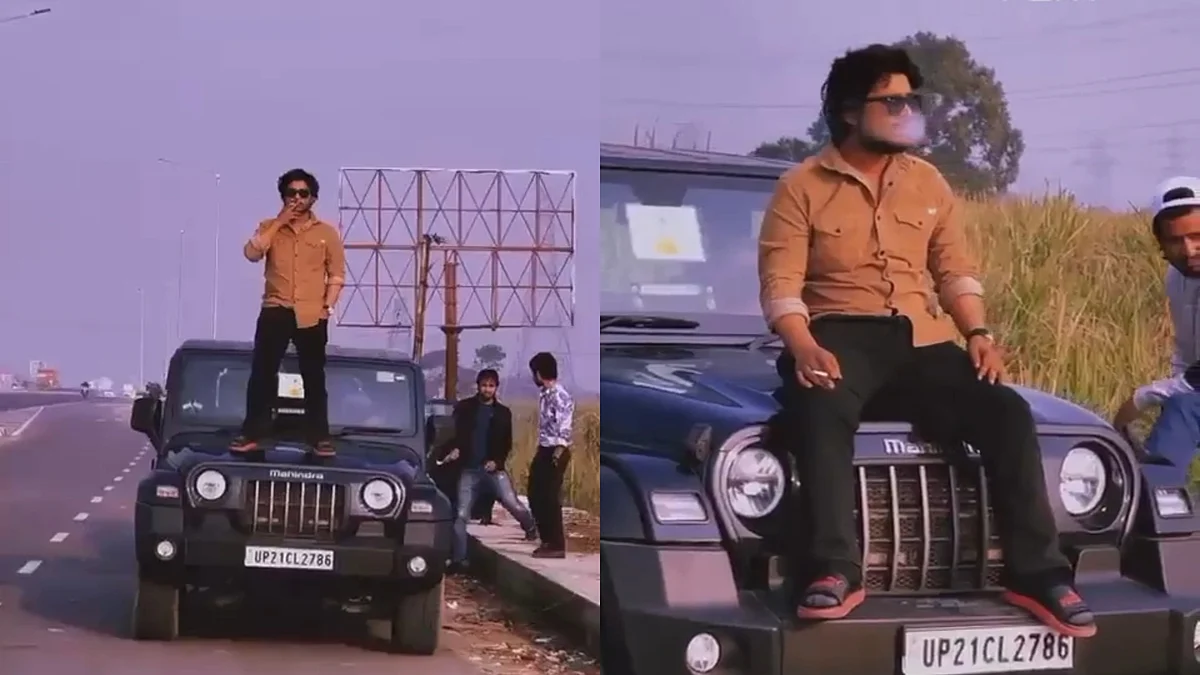 चलती THAR कार पर सिगरेट पीते हुए युवक ने किया स्टंट, 29 हजार रुपये से अधिक का कटा चालान