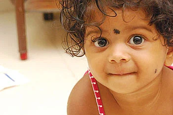 பப்ளிக்குட்டி... ஐஸ் கட்டி !