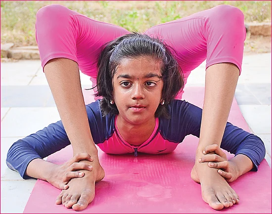 வயது 9, உலகச் சாதனை 14 - ‘யோகா’ பிரிஷா