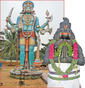 அஞ்சனை மைந்தனுக்கு... மஞ்சள் அரைத்து அலங்காரம்!
