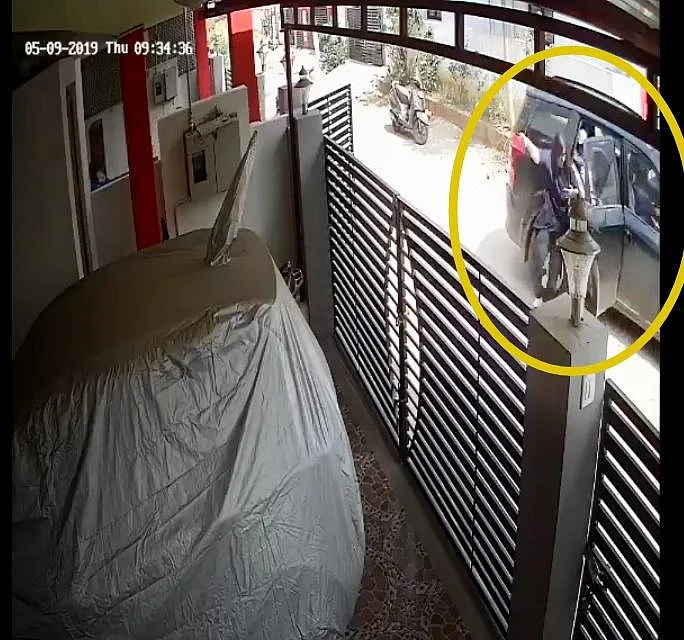 ``ஓடும் காரிலிருந்து மனைவியைக் கீழே தள்ளிய கணவன்!’ - கோவையில் வெளியான அதிர்ச்சி வீடியோ