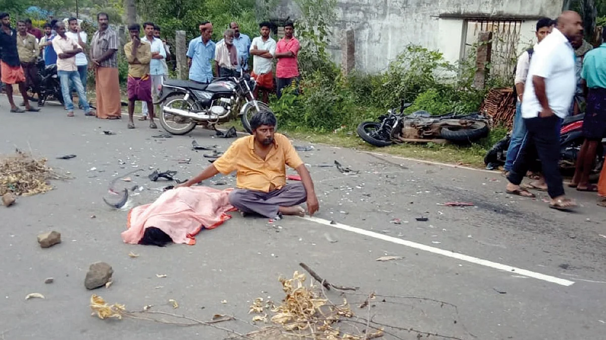 மனைவியின் சடலத்துடன் சாலை மறியல்