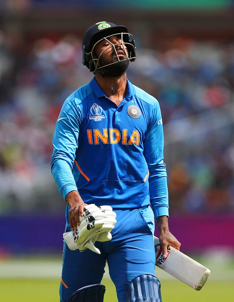 India's K.L. Rahul reacts as he leaves the field after being dismissed by New Zealand's Matt Henry.