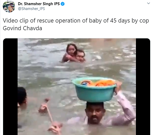 பெருவெள்ளத்தில் சிக்கிய ஒன்றரை மாத பெண் குழந்தை! - கழுத்தளவு நீரில் மீட்ட எஸ்ஐ #ViralVideo
