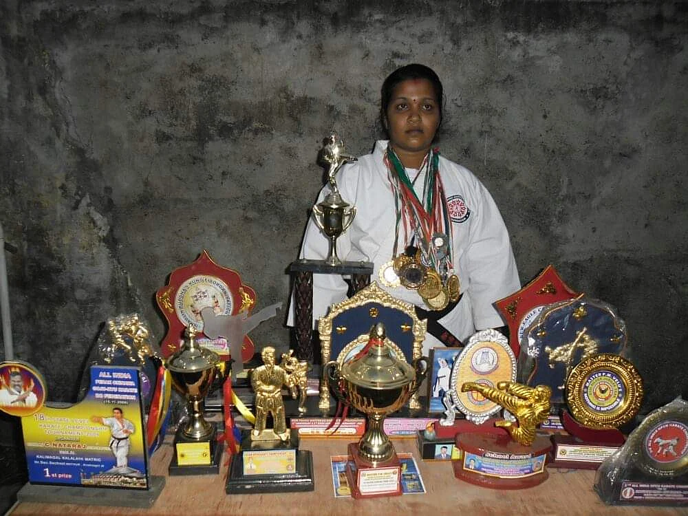 Sangeetha with her medals and awards