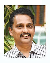 ரெஜி தாமஸ், பங்குச் சந்தை நிபுணர்