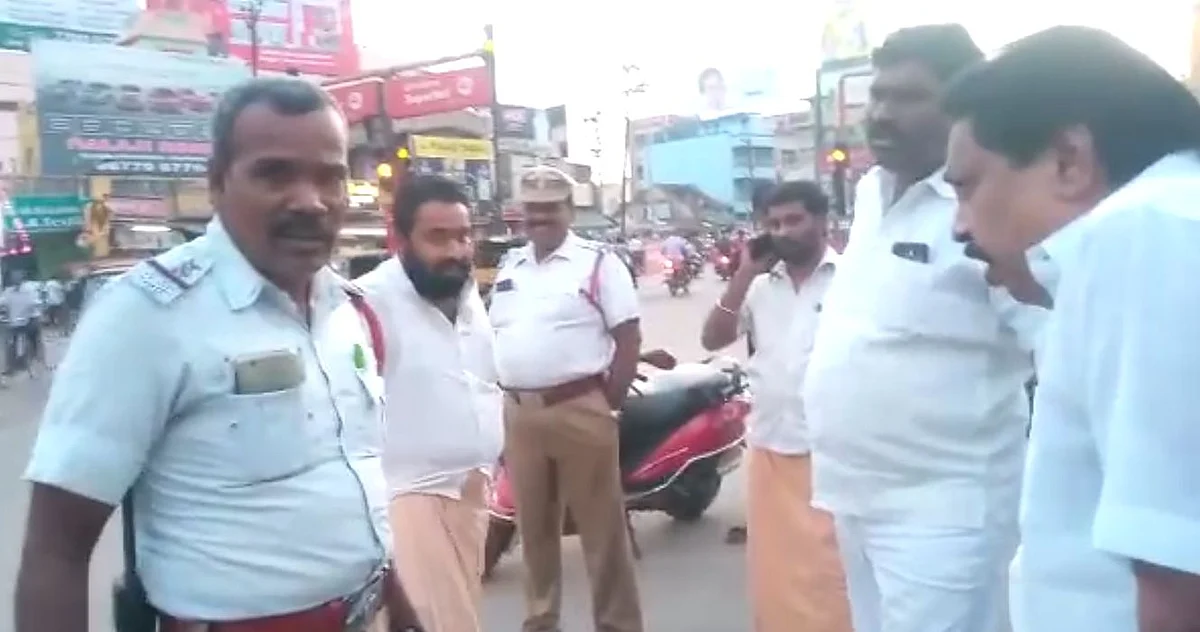 போலீஸ் அதிகாரியிடம் அ.ம.மு.க பிரமுகர் வாக்குவாதம்