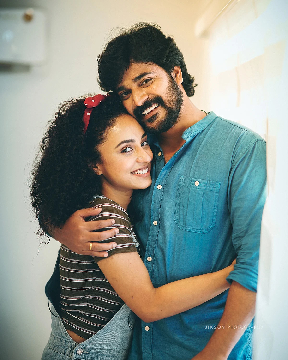 பியர்லி கணவருடன்