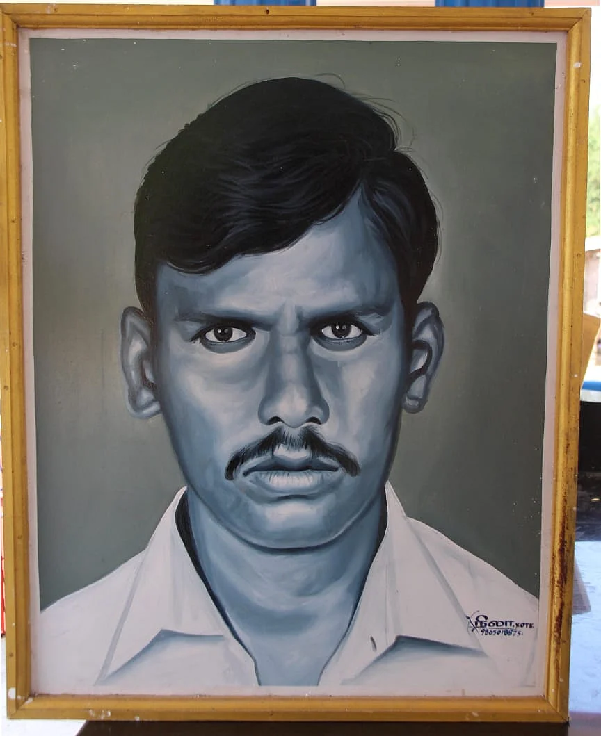 கொலை செய்யப்பட்ட முருகேசன்