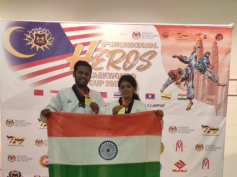 `இரண்டு வருடம்; 15 கின்னஸ் சாதனைகள்!' - அசத்தும் மதுரை `டேக்வாண்டோ’ தம்பதி