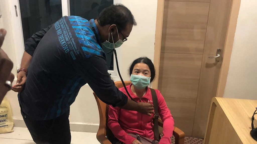 சீன பெண்ணுக்கு பரிசோதனை