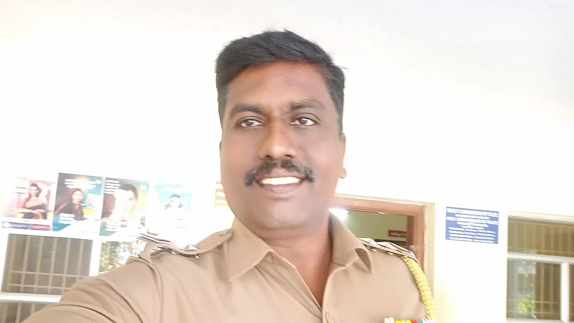 போலீஸ் எஸ்.எஸ்.ஐ பிரபாகரன்