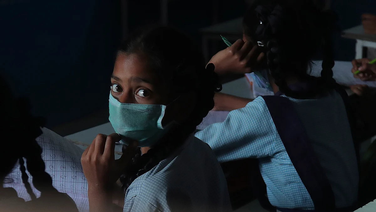 Girl wearing mask to protect from Covid - 19