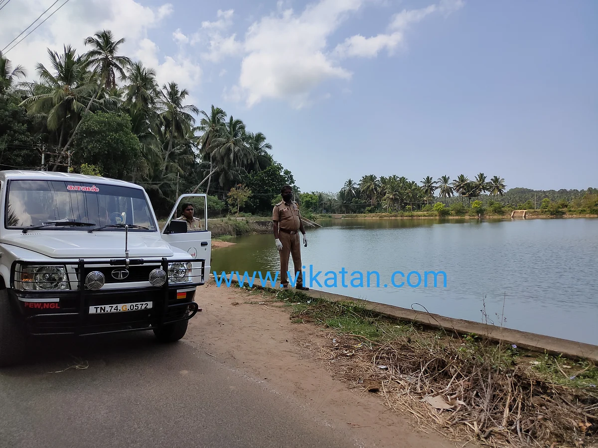 குளக்கரையில் கண்காணிப்புப் பணியில் போலீஸ்