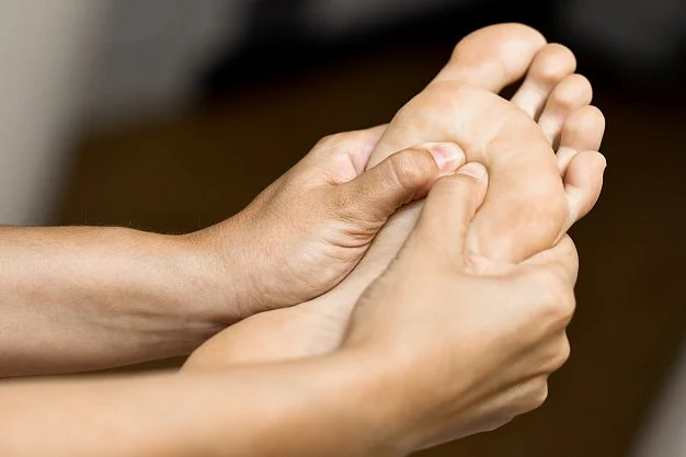 Give a foot massage