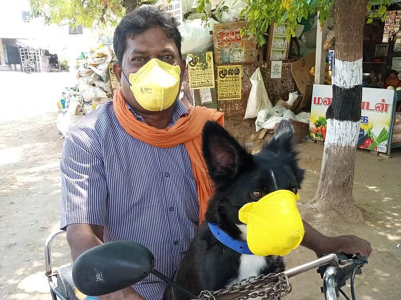 `எனக்கு ராமு இன்னொரு பிள்ளை மாதிரி!’ - நாய்க்கு மாஸ்க் மாட்டி கரிசனம் காட்டும் மனிதர்