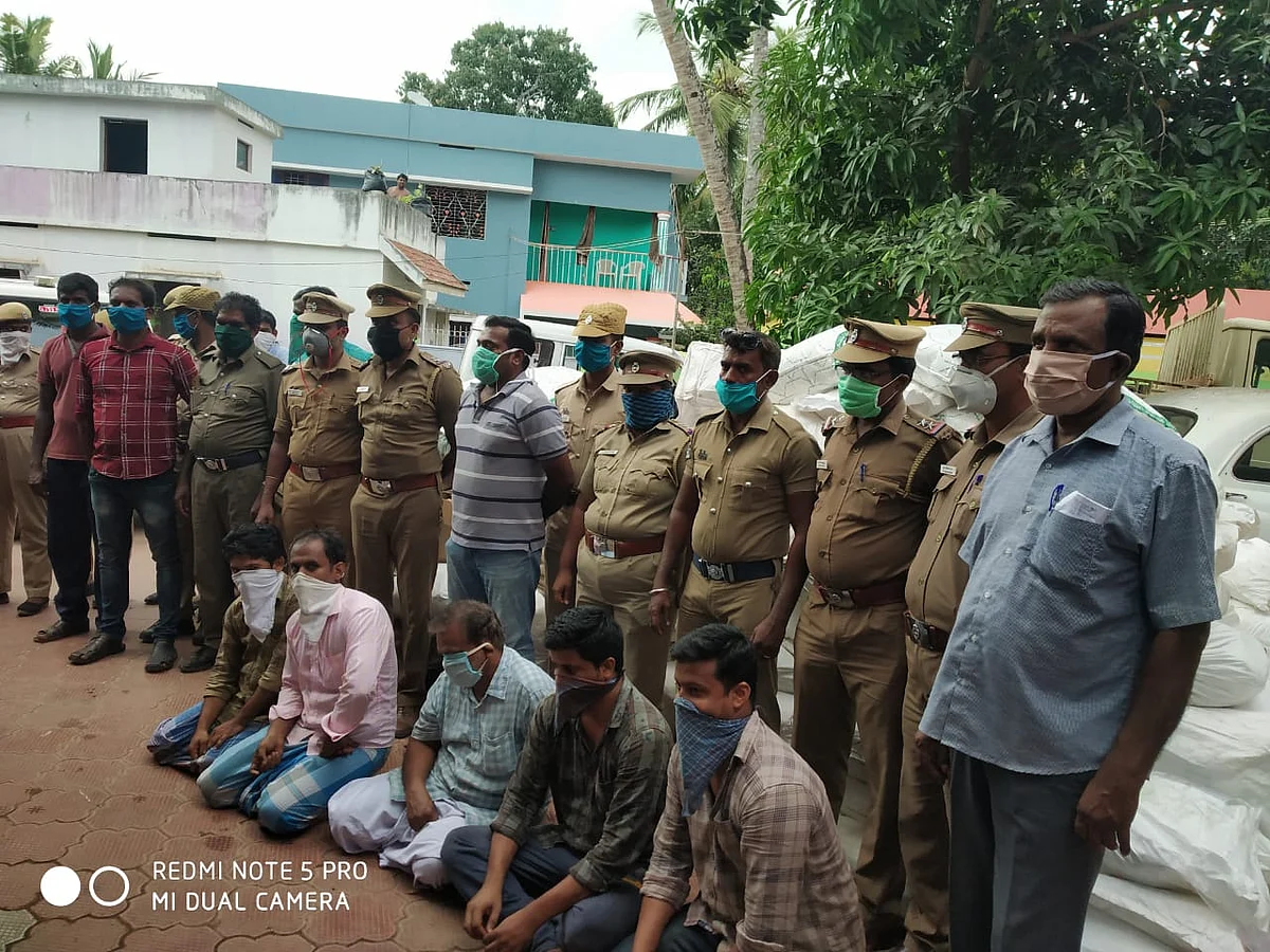 குட்கா பதுக்கியதாக கைது செய்யப்பட்டவர்கள்
