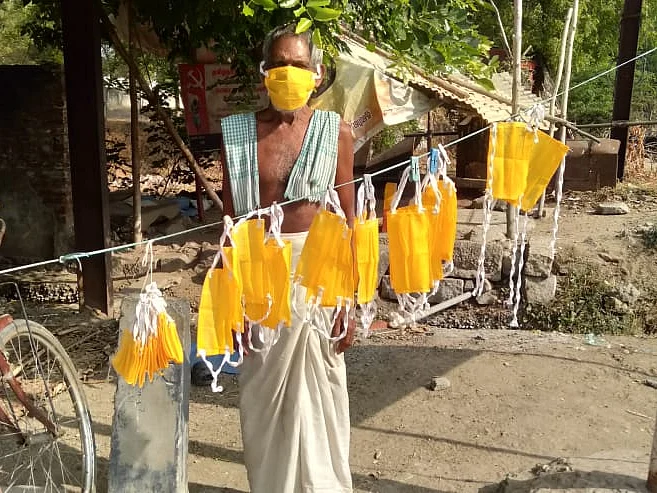 `வீட்டிலேயே முடங்கிக் கிடந்தா சோறு கிடைக்காது..!' -சாத்தூர் பைபாஸில் கவனம் ஈர்த்த முதியவர்