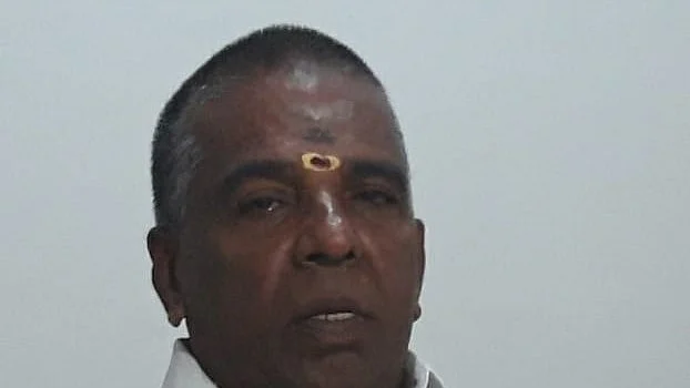 அ.தி.மு.க நிர்வாகி கணேசன்