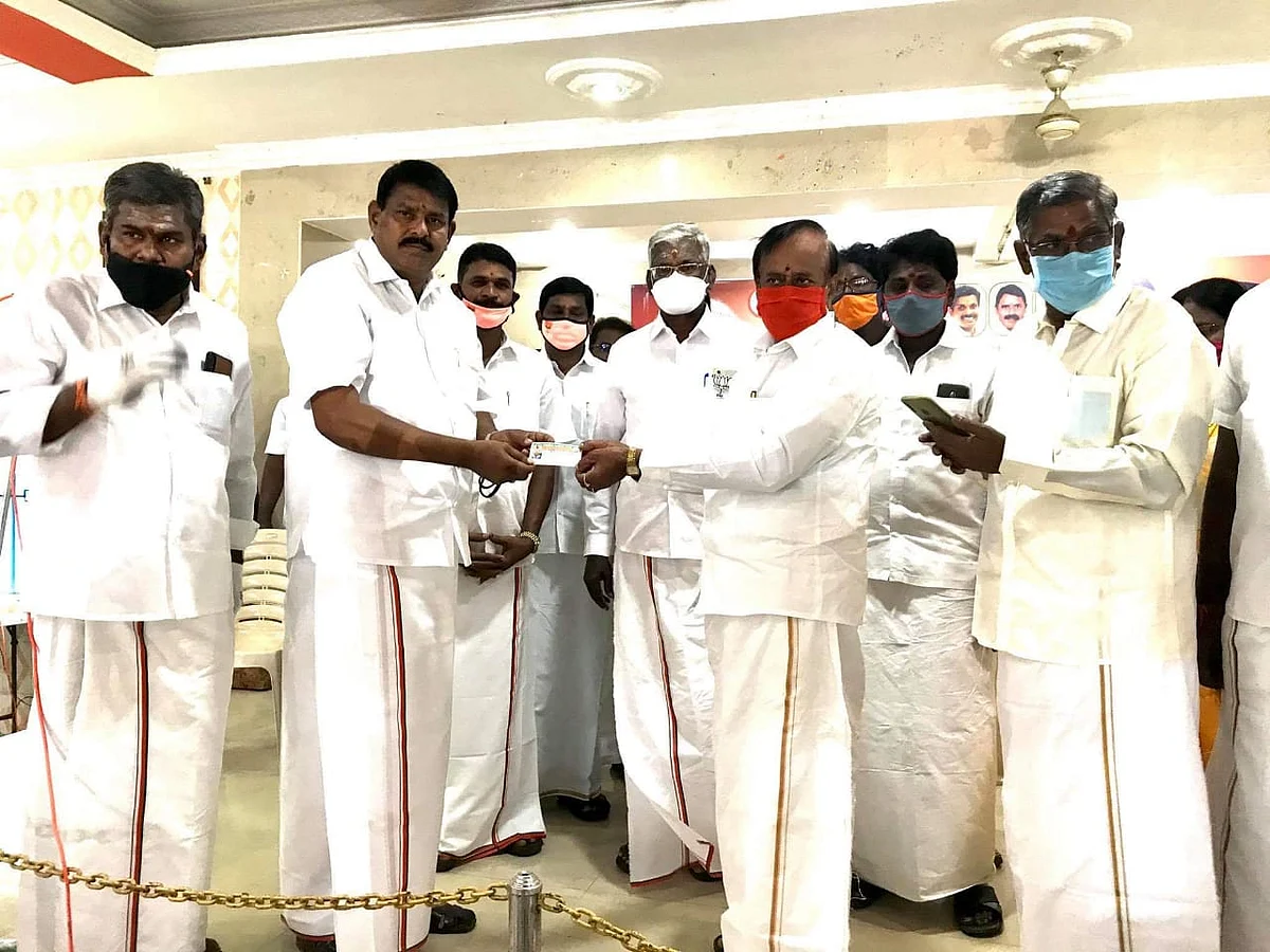 பி.ஜே.பி -யில் இணைந்த குட்லக் ராஜேந்திரன்