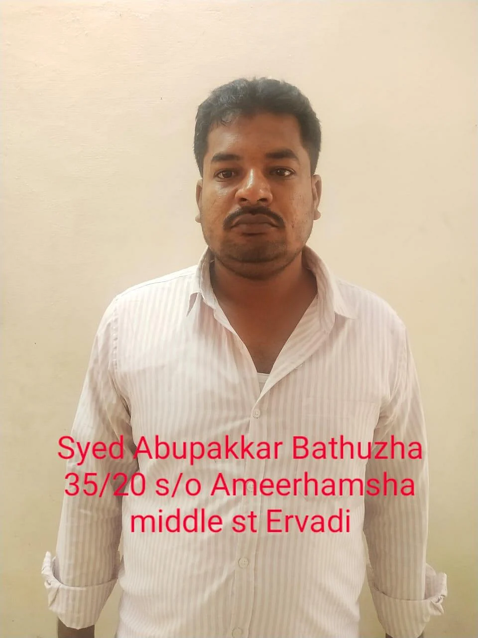 கைது செய்யப்பட்ட பாதுஷா.