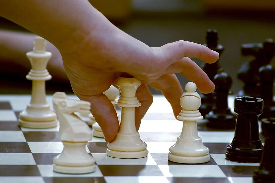 Child playing Chess