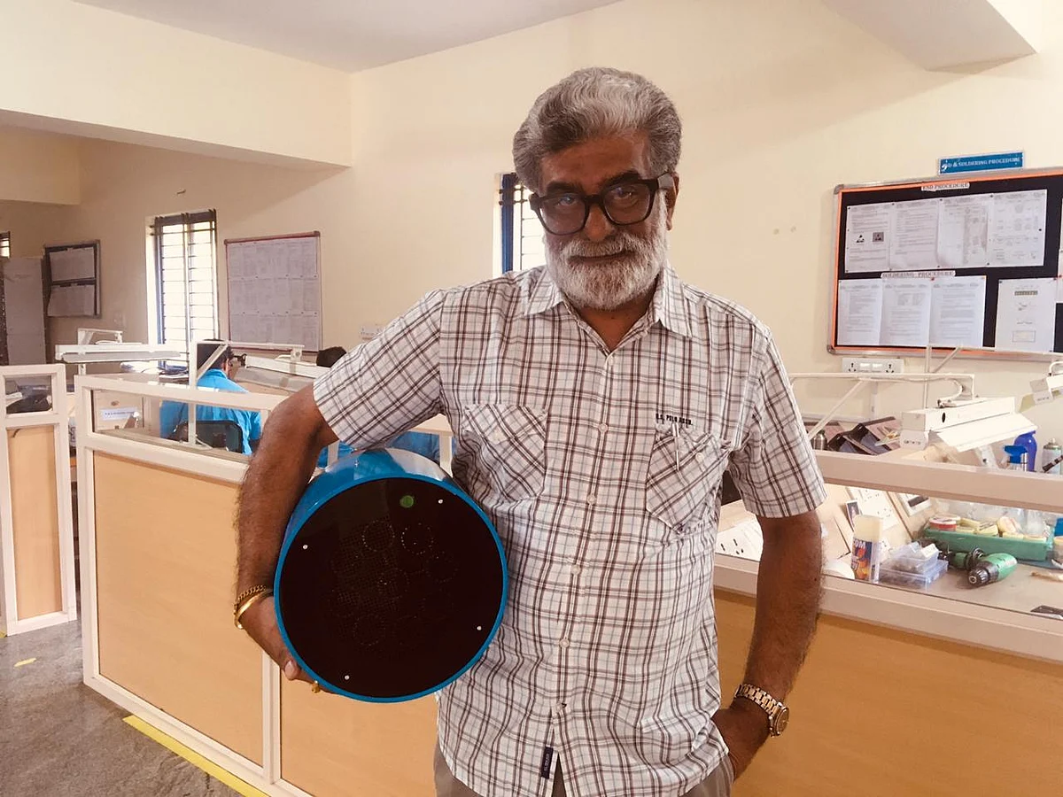 Scientist Rajah Vijay Kumar with the device