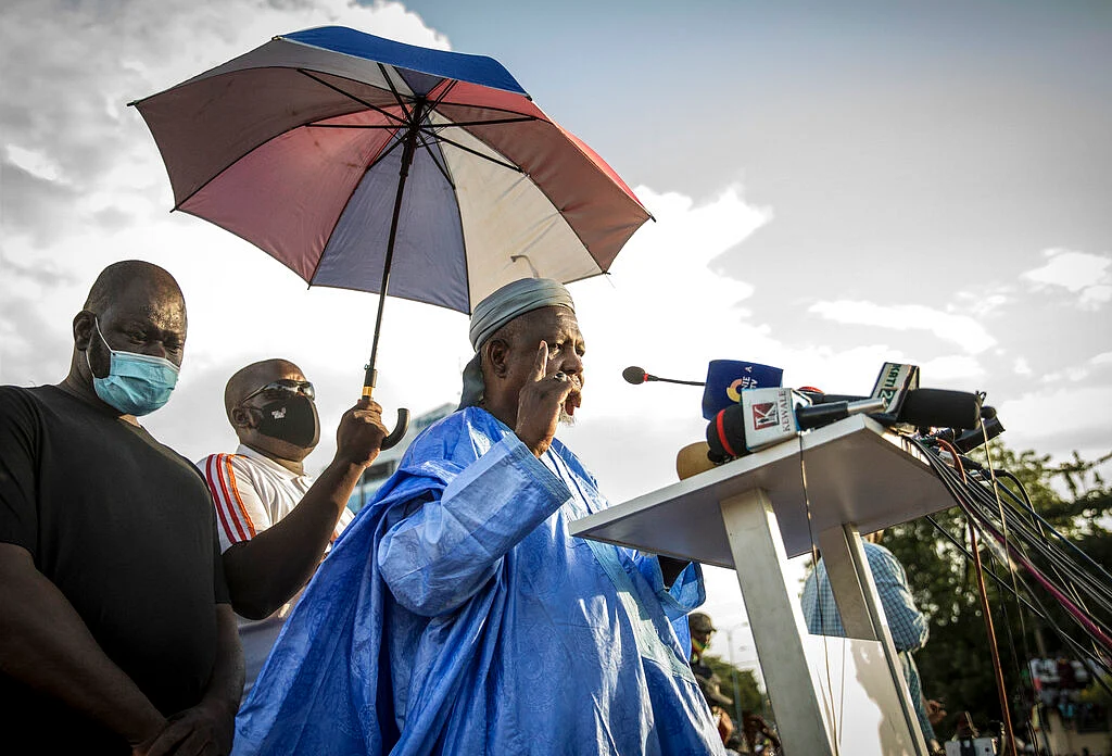 Mahmoud Dicko, an imam who has helped lead the movement against President Ibrahim Boubacar Keita, addresses Malians supporting the recent overthrow of Keita as they gather to celebrate in the capital Bamako, Mali Friday, Aug. 21, 2020.