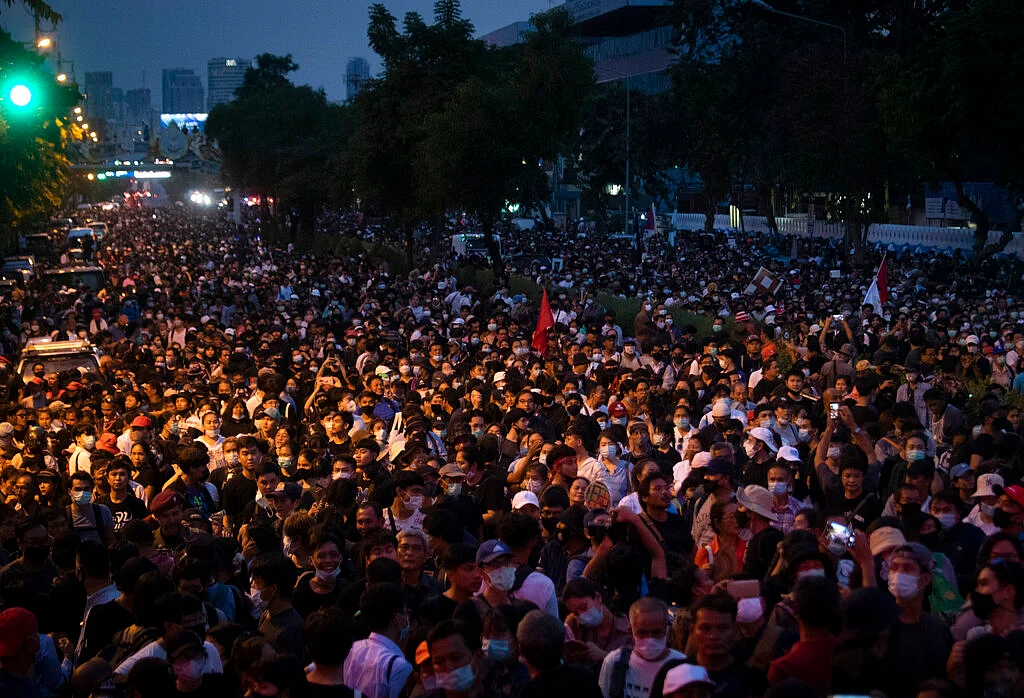Thousand of pro-democracy protesters gather outside the Government House during a rally in Bangkok, Thailand