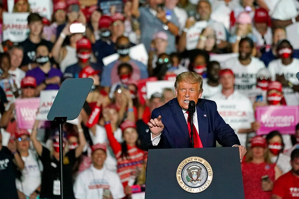 US President Donald Trump speaks at campaign rally at the Orlando Sanford International Airport