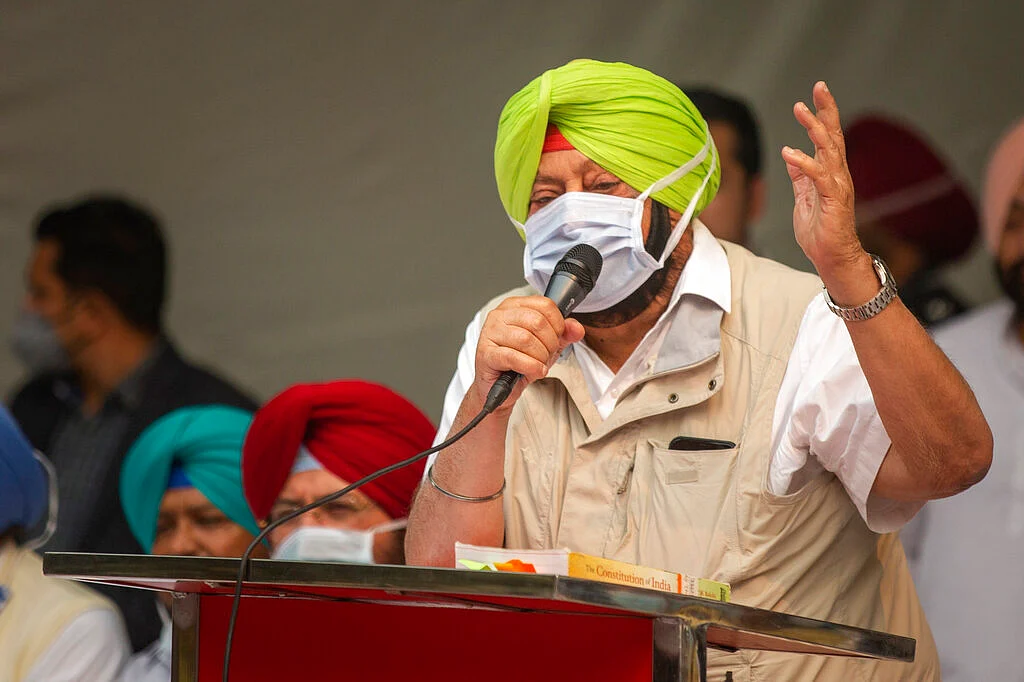 Chief Minister of Punjab state Amarinder Singh addresses a gathering during a protest against