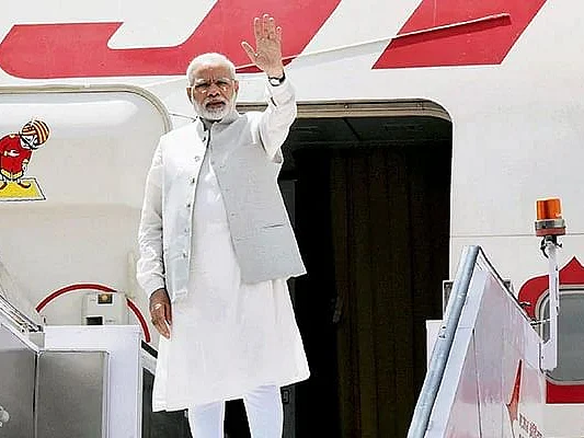 கொரோனாவால் வெளிநாடு செல்லாத மோடி - நாட்டுக்கு லாபம் என்ன, நஷ்டம் என்ன?