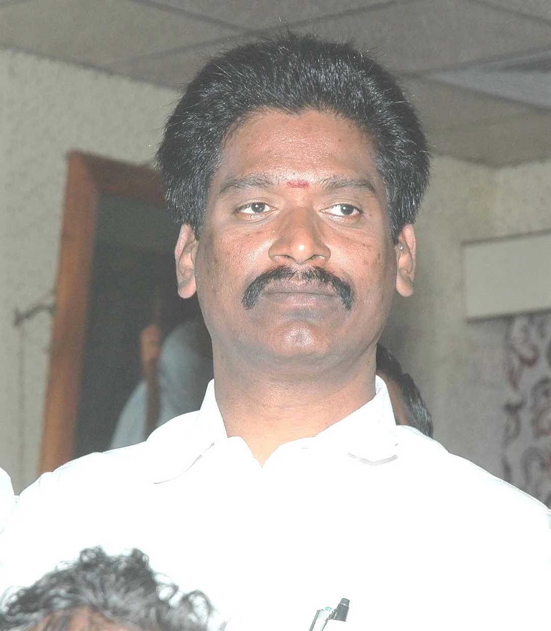 அ.ம.மு.க வேட்பாளர் என்.ஜி.பார்த்திபன்