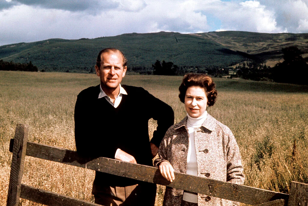 Sept. 1, 1972 file photo, Britain's Queen Elizabeth II and Prince Philip pose at Balmoral, Scotland, to celebrate their Silver Wedding anniversary.