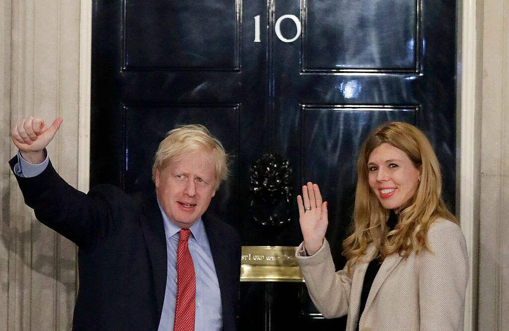 Britain's Prime Minister Boris Johnson and his partner Carrie Symonds