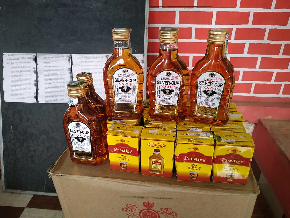 கும்பகோணம்: வெளியே காய்கறி; உள்ளே மதுப்பாட்டில்... கடத்தல் கும்பலை வளைத்த போலீஸ்!
