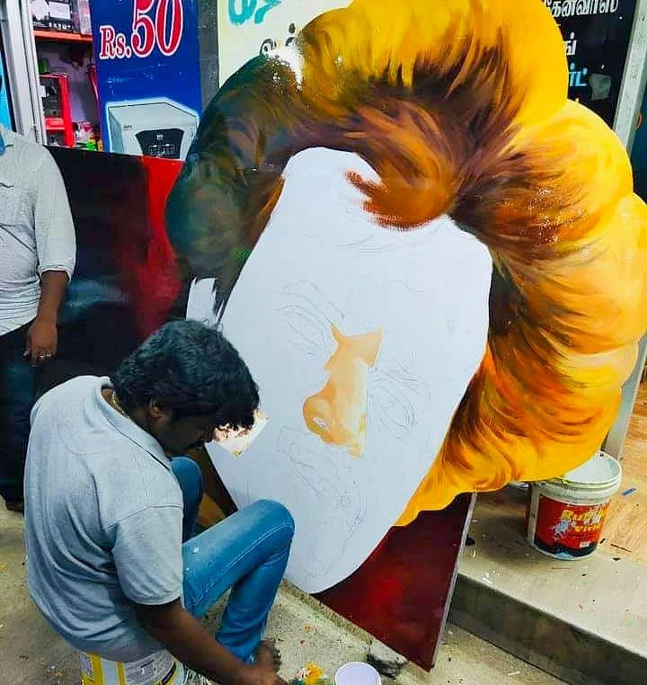 ரஜினி படம் வரையும் ஓவியக் கலைஞர்