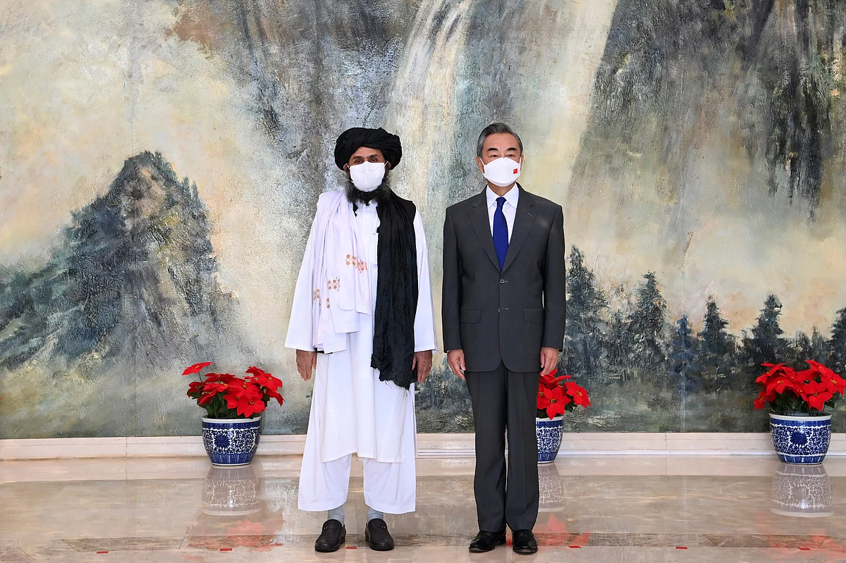 China & Afghanistan | Taliban co-founder Mullah Abdul Ghani Baradar, left, and Chinese Foreign Minister Wang Yi, Right