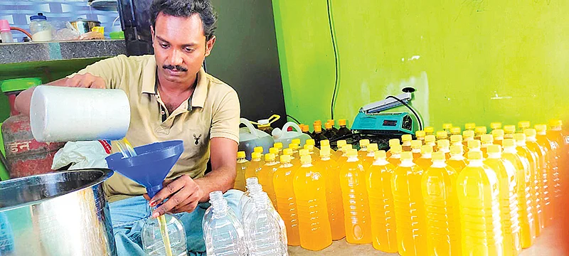 எண்ணெய் அளக்கும் பணியில்