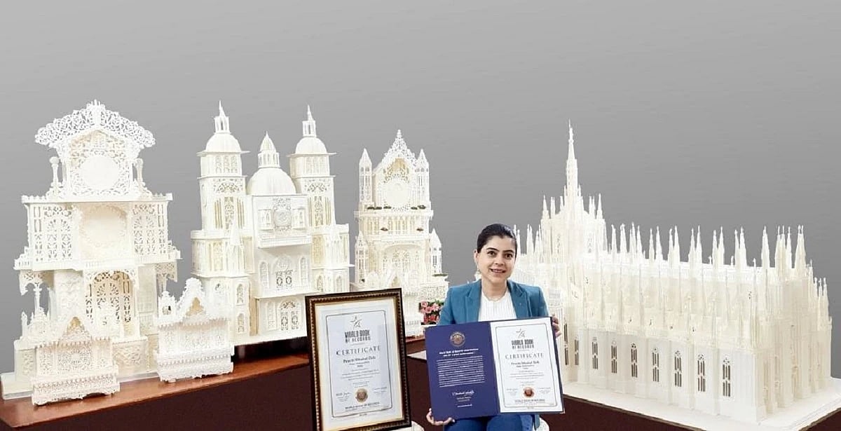 100 கிலோவில் ராட்சத வீகன் ஐஸிங் கேக்; உலக சாதனை புத்தகத்தில் இடம்பிடித்த புனே பெண்!