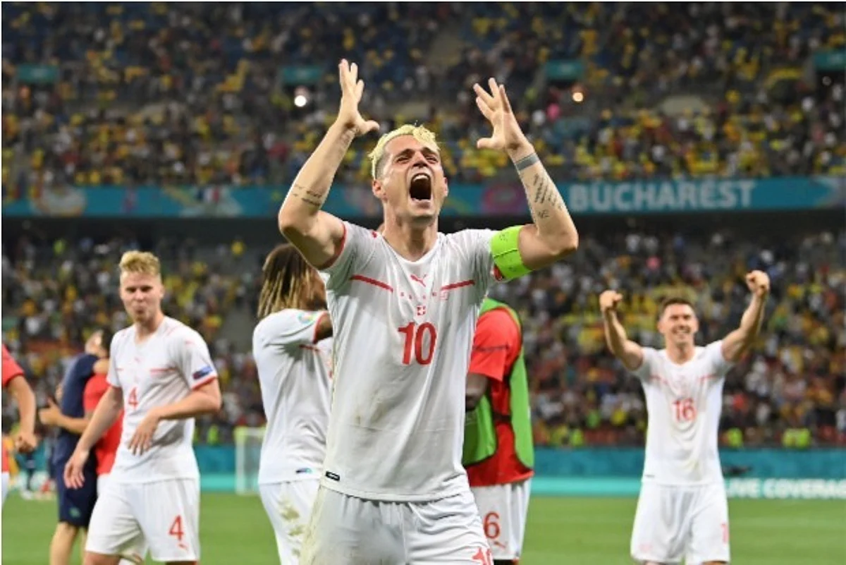 Switzerland celebrates historic win over France