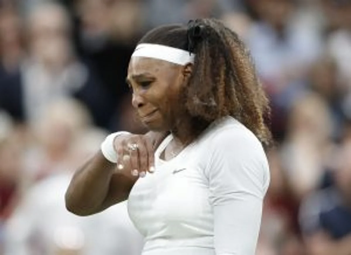 Tennis – Wimbledon – All England Lawn Tennis and Croquet Club, London, Britain – June 29, 2021 Serena Williams of the U.S. reacts after sustaining an injury during her first round match against Belarus' Aliaksandra Sasnovich REUTERS/Peter Nicholls