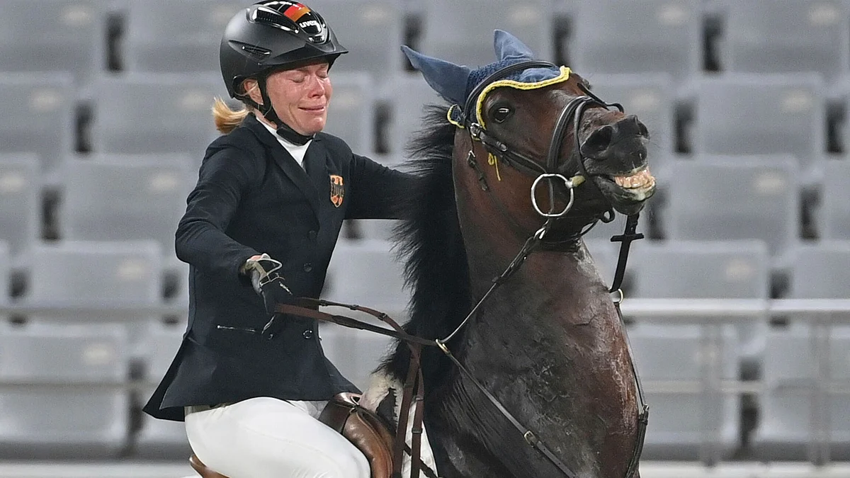 Tokyo 2020: German coach kicked out of Olympics for punching horse